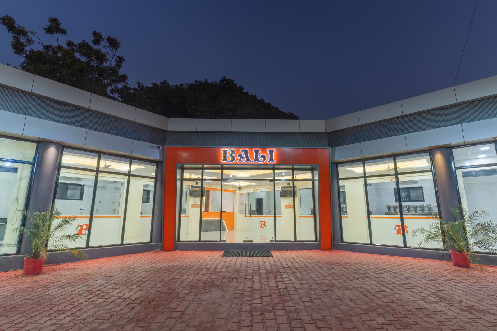 Well-lit Bali Meat Junction shop entrance and glass front